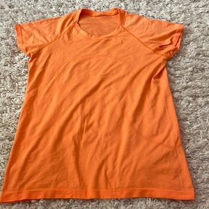 lululemon swiftly tech short sleeve top in orange